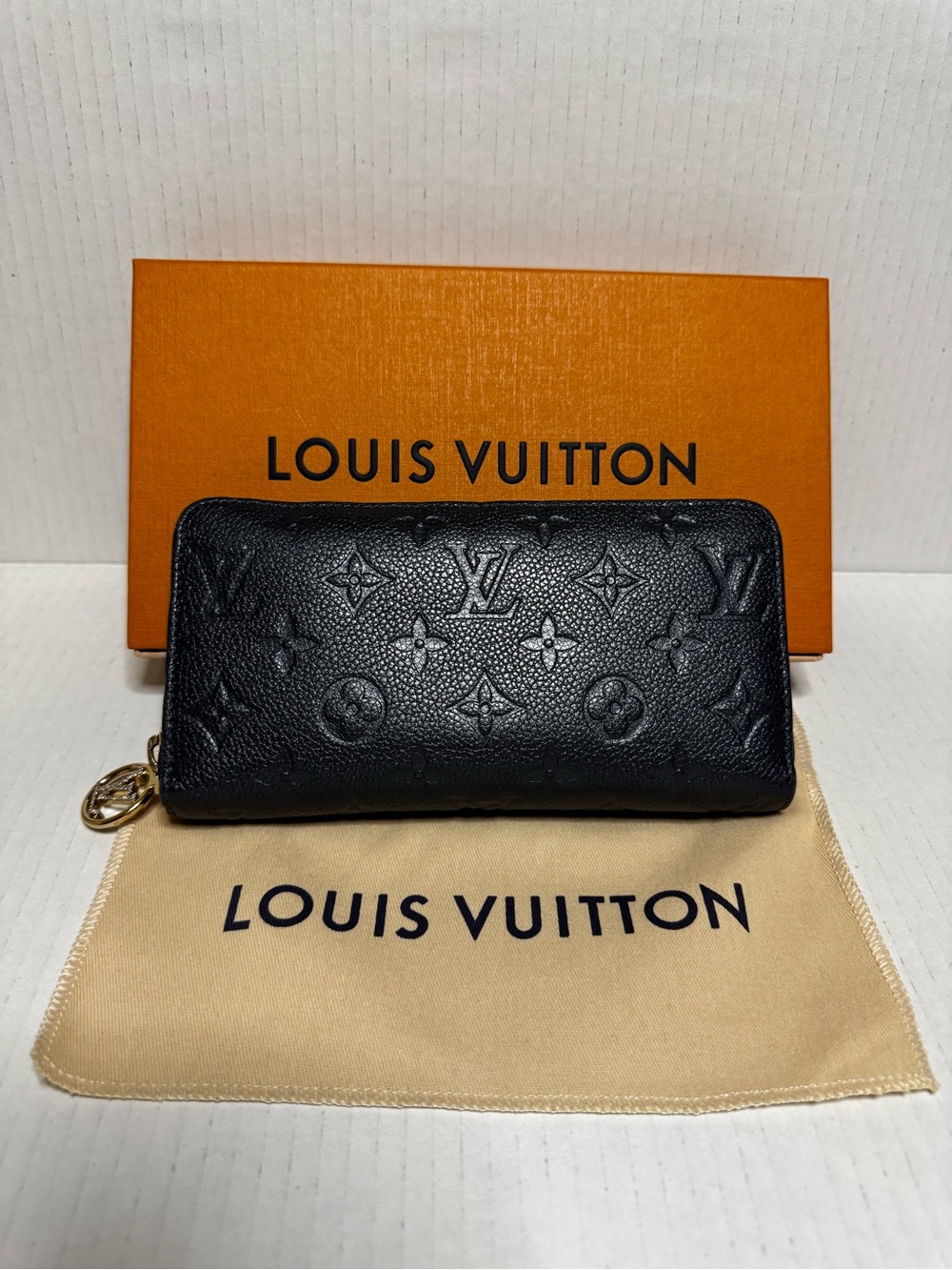 Louis Vuitton iridescent blue Embossed Monogram Zip Wallet with Gold Hardware